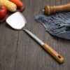 O1CN010FiSHK2N8xM9bmxK8_2208937239919-0-cib.jpg Wood-Grain Handle Stainless Steel Spatula
