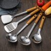 O1CN01TEzGoB2N8xM8y4b4N_2208937239919-0-cib.jpg Wood-Grain Handle Stainless Steel Spatula